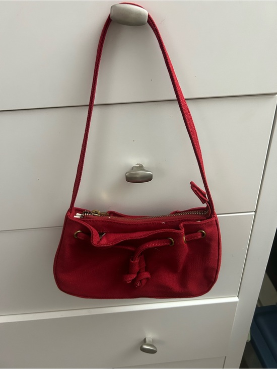 Brandy Melville Handbags - Brandy Melville Red Canvas Drawstring Crossbody Bag